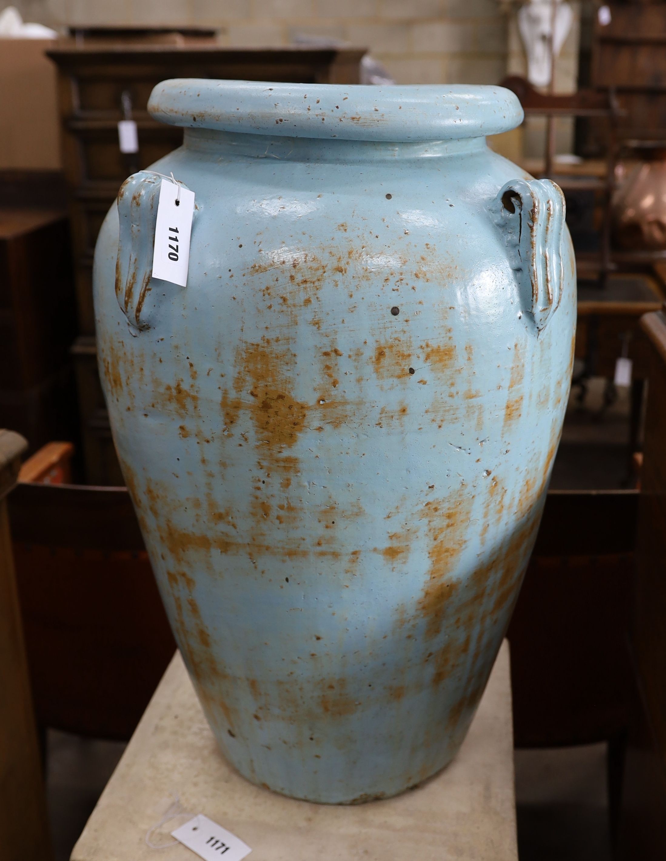 A large blue glazed earthenware garden planter, height 65cm